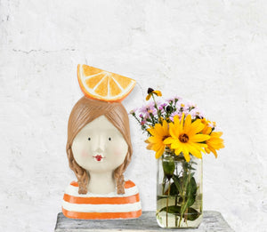Κεραμικό Διακοσμητικό Κοπέλα Με Καπέλο Φέτα Πορτοκάλι